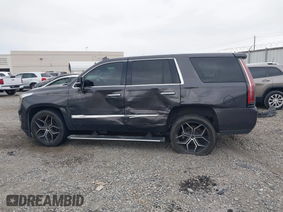 2016 Cadillac Escalade Platinum z VIN 1GYS4DKJ1GR363238, wystawiony jako IAAI lot #40974636 z przebiegiem 128 296 mil mil oraz . Historia ofert i sprzedaży dostępna na DreamBid. Obrazek 14.