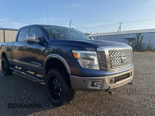 2016 Nissan Titan XD Platinum Reserve with VIN 1N6BA1F25GN500038, listed as a Copart auction lot 84605344 with 205,859 mi miles and Salvage Title. Bid and sale history available at carsss.com. Image 1.