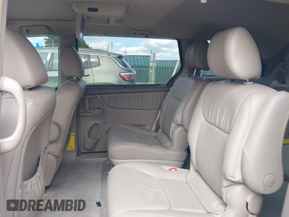 2009 Toyota Sienna XLE with VIN 5TDZK22C79S259793, listed as a IAAI auction lot 41905617 with 185,121 mi miles and . Bid and sale history available at DreamBid. Image 8.