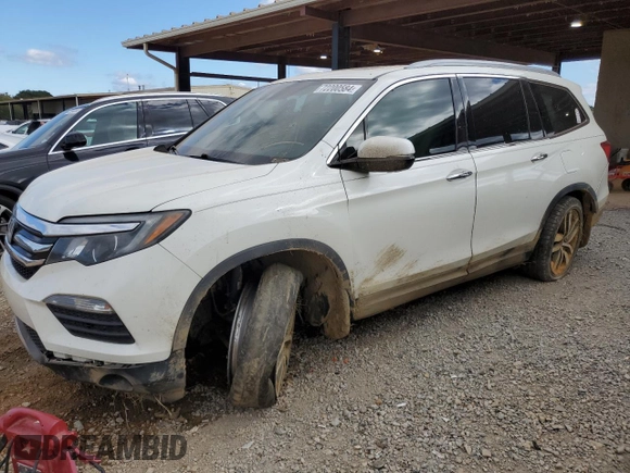 2017 Honda Pilot Touring z VIN 5FNYF6H92HB067140, wystawiony jako Copart lot #72200584 z przebiegiem 127 856 mil mil oraz Szkoda całkowita • Salvage title. Historia ofert i sprzedaży dostępna na DreamBid. Obrazek 1.