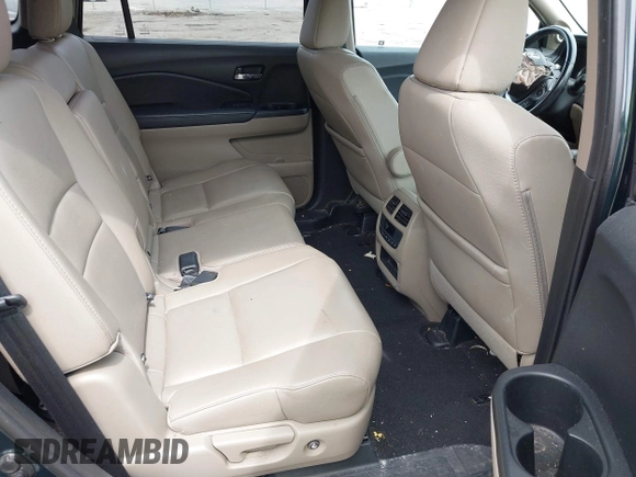 2017 Honda Pilot EX-L with VIN 5FNYF6H50HB033968, listed as a IAAI auction lot 42400720 with 119,597 mi miles and . Bid and sale history available at DreamBid. Image 8.