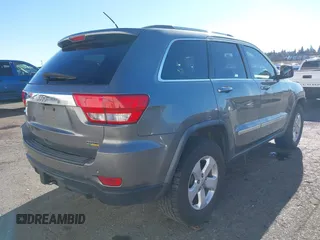 2011 Jeep Grand Cherokee Laredo with VIN 1J4RR4GG9BC714325, listed as a IAAI auction lot 41560915 with 153,372 mi miles and . Bid and sale history available at DreamBid. Image 4.