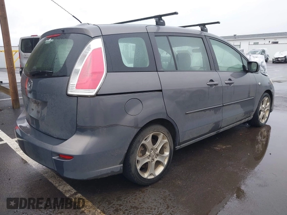 2009 Mazda 5 Touring with VIN JM1CR29L690356302, listed as a IAAI auction lot 41573737 with 127,276 mi miles. Bid and sale history available at carsss.com. Image 4.