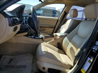 2006 BMW 3 Series 325i with VIN WBAVB13546KX37483, listed as a Copart auction lot 62717615 with 154,957 mi miles and Salvage title. Bid and sale history available at DreamBid. Image 7.