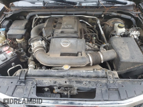 2010 Nissan Frontier SE z VIN 1N6AD0CU3AC438421, wystawiony jako Copart lot #87771565 z przebiegiem 110 179 mil mil oraz Szkoda całkowita • Salvage title. Historia ofert i sprzedaży dostępna na DreamBid. Obrazek 11.
