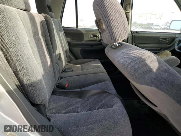 1999 Honda CR-V LX with VIN JHLRD2844XC016583, listed as a Copart auction lot 73747274 with 104,730 mi miles and Salvage Title. Bid and sale history available at carsss.com. Image 11.