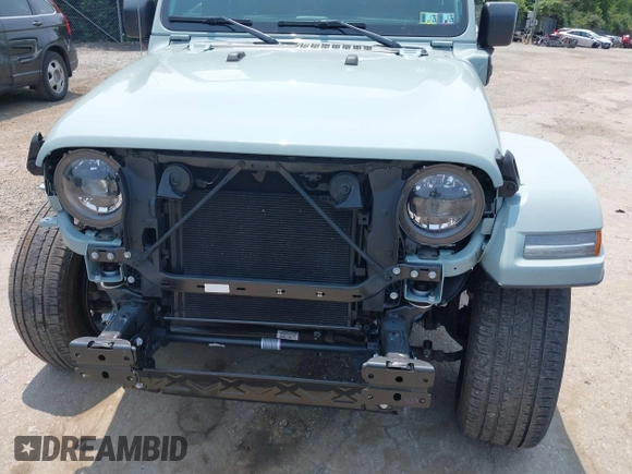 2023 Jeep Wrangler Sahara with VIN 1C4JJXP6XPW554741, listed as a IAAI auction lot 42380681 with 15,148 mi miles and . Bid and sale history available at DreamBid. Image 6.