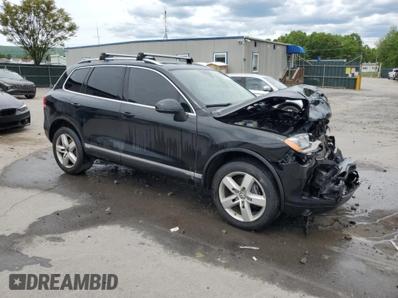 2012 Volkswagen Touareg Sport z VIN WVGEF9BP7CD009824, wystawiony jako Copart lot #58311915 z przebiegiem 154 397 mil mil oraz Szkoda całkowita • Salvage title. Historia ofert i sprzedaży dostępna na DreamBid. Obrazek 4.