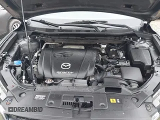 2016 Mazda CX-5 Sport with VIN JM3KE4BY5G0885754, listed as a IAAI auction lot 41103575 with 136,263 mi miles and . Bid and sale history available at carsss.com. Image 10.