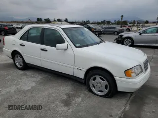 1997 Mercedes-Benz C with VIN WDBHA28E3VF582237, listed as a Copart auction lot 76826534 with 240,702 mi miles and Clean Title. Bid and sale history available at carsss.com. Image 4.