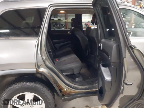 2011 Jeep Grand Cherokee Laredo with VIN 1J4RR4GG3BC623048, listed as a IAAI auction lot 42163452 with 192,241 mi miles and . Bid and sale history available at DreamBid. Image 8.