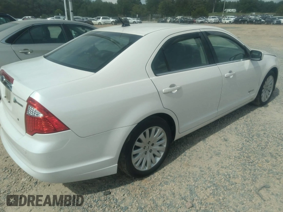 2010 Ford Fusion Hybrid z VIN 3FADP0L31AR387443, wystawiony jako IAAI lot #40034145 z przebiegiem 153 847 mil mil oraz . Historia ofert i sprzedaży dostępna na DreamBid. Obrazek 4.
