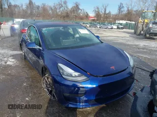 2018 Tesla Model 3 Long Range Battery with VIN 5YJ3E1EB8JF115138, listed as a IAAI auction lot 41343399 with 62,351 mi miles and . Bid and sale history available at DreamBid. Image 13.