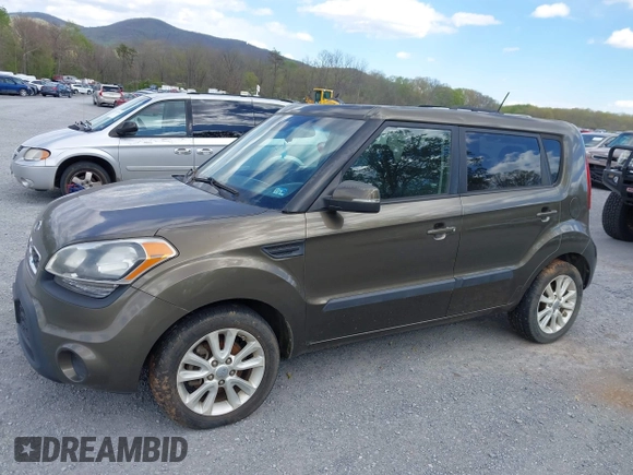 2012 Kia Soul + with VIN KNDJT2A63C7355735, listed as a IAAI auction lot 42041895 with 182,296 mi miles. Bid and sale history available at carsss.com. Image 6.