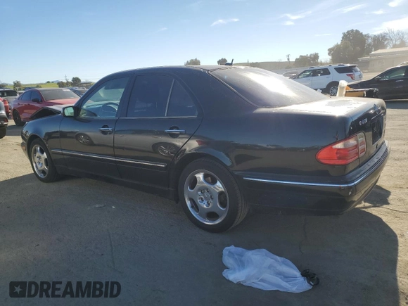 2001 Mercedes-Benz E-Class with VIN WDBJF70JX1B327997, listed as a Copart auction lot 87650175 with 268,045 mi miles and Salvage Title. Bid and sale history available at carsss.com. Image 2.