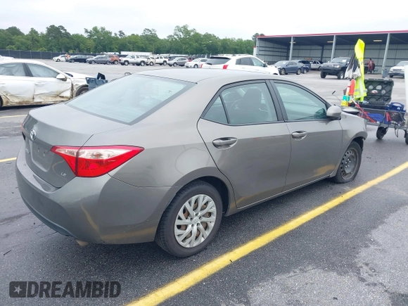 2018 Toyota Corolla L with VIN 2T1BURHE9JC092895, listed as a IAAI auction lot 42326623 with 135,046 mi miles and . Bid and sale history available at DreamBid. Image 4.