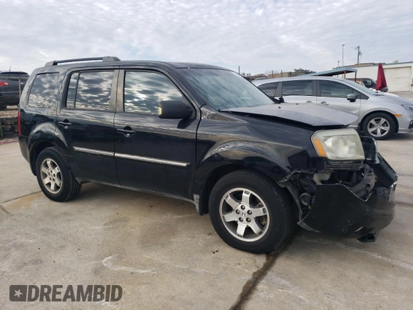 2010 Honda Pilot Touring with VIN 5FNYF3H83AB019030, listed as a Copart auction lot 82398644 with 180,912 mi miles and Salvage Title. Bid and sale history available at DreamBid. Image 4.