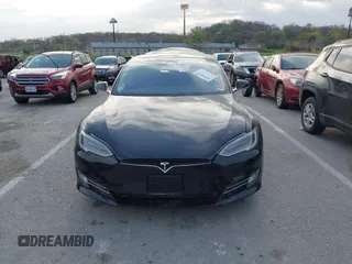 2017 Tesla Model S 100D with VIN 5YJSA1E28HF188981, listed as a IAAI auction lot 42010115 with 76,327 mi miles and . Bid and sale history available at DreamBid. Image 12.