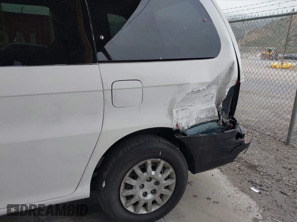 2003 Kia Sedona LX with VIN KNDUP131536402900, listed as a IAAI auction lot 41500260 with 143,825 mi miles and . Bid and sale history available at DreamBid. Image 6.