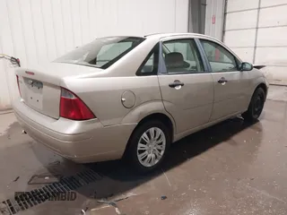2007 Ford Focus S with VIN 1FAFP34N67W226828, listed as a IAAI auction lot 41457517 with 174,519 mi miles and . Bid and sale history available at DreamBid. Image 4.
