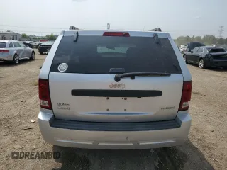 2005 Jeep Grand Cherokee Laredo z VIN 1J4GR48KX5C581833, wystawiony jako Copart lot #60975355 z przebiegiem 149 993 mil mil oraz Szkoda całkowita • Salvage title. Historia ofert i sprzedaży dostępna na DreamBid. Obrazek 6.
