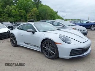 2024 Porsche 911 Carrera z VIN WP0AA2A91RS207170, wystawiony jako IAAI lot #42298326 z przebiegiem 7 158 mil mil oraz . Historia ofert i sprzedaży dostępna na DreamBid. Obrazek 1.