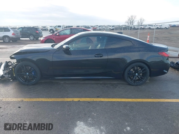 2021 BMW 4 Series M440i xDrive with VIN WBA13AR05MCG58597, listed as a IAAI auction lot 41475262 with 42,626 mi miles and . Bid and sale history available at DreamBid. Image 14.