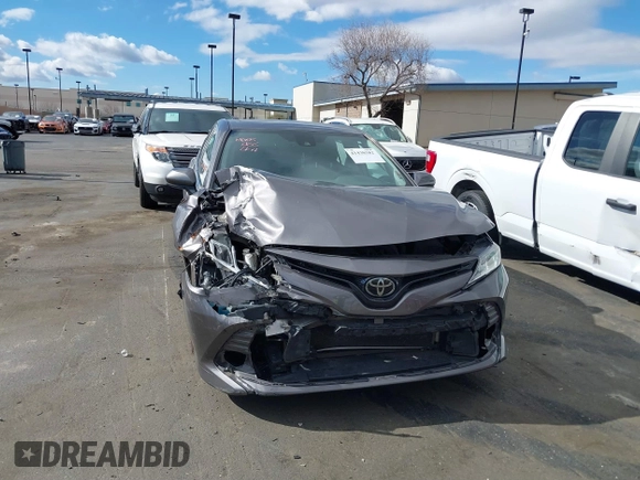 2020 Toyota Camry LE with VIN 4T1C11AK3LU363417, listed as a IAAI auction lot 41430382 with 130,837 mi miles. Bid and sale history available at carsss.com. Image 6.