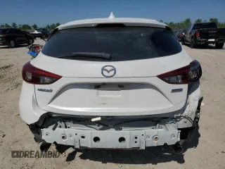 2014 Mazda 3 S Grand Touring z VIN JM1BM1M33E1163458, wystawiony jako Copart lot #52093725 z przebiegiem 141 757 mil mil oraz Szkoda całkowita • Salvage title. Historia ofert i sprzedaży dostępna na DreamBid. Obrazek 6.