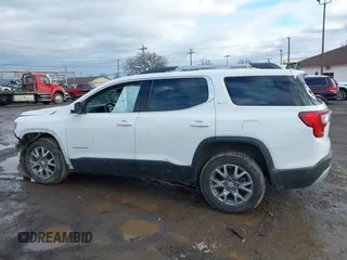 2020 GMC Acadia SLT with VIN 1GKKNULS8LZ124343, listed as a IAAI auction lot 41245060 with 100,436 mi miles and . Bid and sale history available at DreamBid. Image 14.