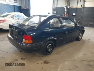 1996 Toyota Tercel DX z VIN JT2AC52L9T0139217, wystawiony jako IAAI lot #41898808 z przebiegiem 86 500 mil mil oraz . Historia ofert i sprzedaży dostępna na DreamBid. Obrazek 4.