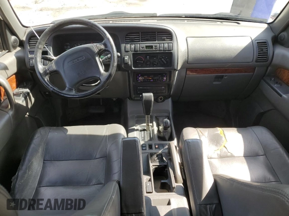 1999 Isuzu Trooper S с VIN JACDJ58X6X7928036, выставлен на аукционе Copart как лот 47035495 с пробегом 181 558 миль миль и Списание • Salvage title. История ставок и продаж доступна на DreamBid. Изображение 8.