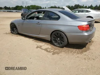 2011 BMW 3 Series 335i xDrive with VIN WBAKF9C54BE620114, listed as a Copart auction lot 56594205 with 85,473 mi miles and Salvage title. Bid and sale history available at DreamBid. Image 2.