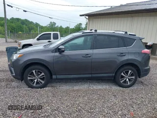 2016 Toyota RAV4 XLE with VIN 2T3RFREV4GW494108, listed as a IAAI auction lot 42234227 with 102,216 mi miles and . Bid and sale history available at DreamBid. Image 14.