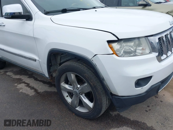 2013 Jeep Grand Cherokee Overland with VIN 1C4RJECG3DC620873, listed as a IAAI auction lot 40909601 with 195,374 mi miles. Bid and sale history available at carsss.com. Image 6.