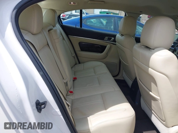 2014 Lincoln MKS z VIN 1LNHL9DK7EG601720, wystawiony jako IAAI lot #42464979 z przebiegiem 58 163 mil mil oraz . Historia ofert i sprzedaży dostępna na DreamBid. Obrazek 8.