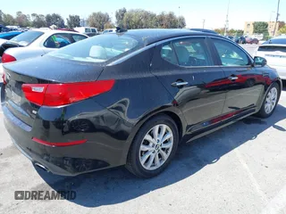 2015 Kia Optima LX with VIN KNAGM4A7XF5615069, listed as a IAAI auction lot 42234624 with 174,078 mi miles and . Bid and sale history available at DreamBid. Image 4.