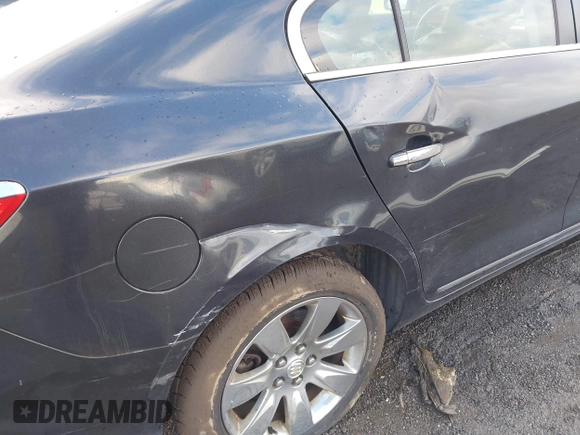 2013 Buick LaCrosse Premium 1 with VIN 1G4GG5E36DF128414, listed as a IAAI auction lot 40920110 with 96,125 mi miles and . Bid and sale history available at DreamBid. Image 6.