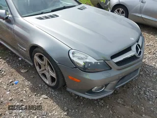 2011 Mercedes-Benz SL 550 z VIN WDBSK7BA9BF165156, wystawiony jako IAAI lot #42075223 z przebiegiem 41 313 mil mil oraz . Historia ofert i sprzedaży dostępna na DreamBid. Obrazek 6.