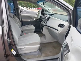 2014 Toyota Sienna L with VIN 5TDZK3DC8ES470837, listed as a IAAI auction lot 42426844 with 302,661 mi miles and . Bid and sale history available at DreamBid. Image 5.