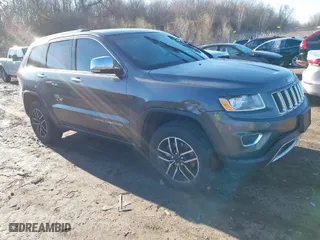 2015 Jeep Grand Cherokee Limited with VIN 1C4RJFBG8FC665897, listed as a IAAI auction lot 41731851 with 223,151 mi miles. Bid and sale history available at carsss.com. Image 1.