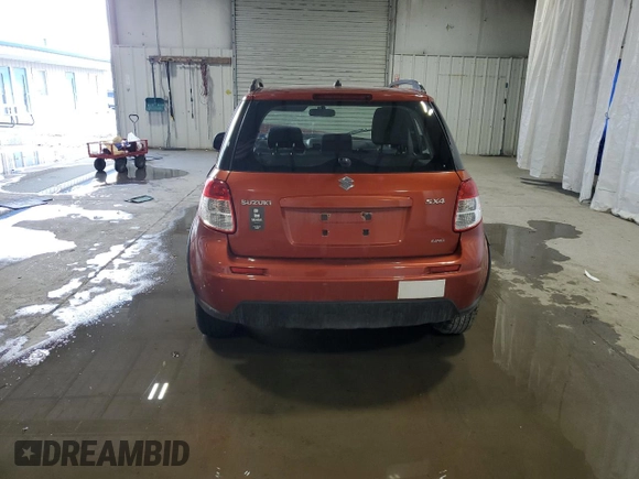 2013 Suzuki SX4 Crossover z VIN JS2YB5A3XD6101784, wystawiony jako Copart lot #45408295 z przebiegiem Nie podano mil oraz Szkoda całkowita • Salvage title. Historia ofert i sprzedaży dostępna na DreamBid. Obrazek 6.