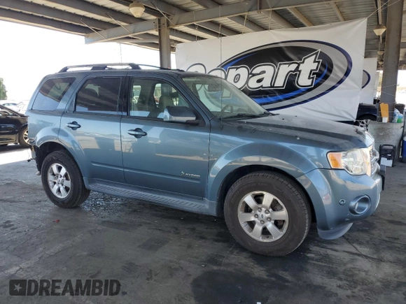 2010 Ford Escape Hybrid with VIN 1FMCU4K32AKB06645, listed as a Copart auction lot 63124055 with 162,646 mi miles and Salvage title. Bid and sale history available at DreamBid. Image 4.