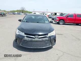 2015 Toyota Camry LE with VIN 4T1BD1FKXFU164963, listed as a IAAI auction lot 42132724 with 141,089 mi miles and . Bid and sale history available at DreamBid. Image 6.