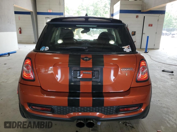2013 MINI Hardtop S with VIN WMWSV3C52DT396176, listed as a Copart auction lot 59207165 with 104,194 mi miles and Salvage title. Bid and sale history available at DreamBid. Image 6.
