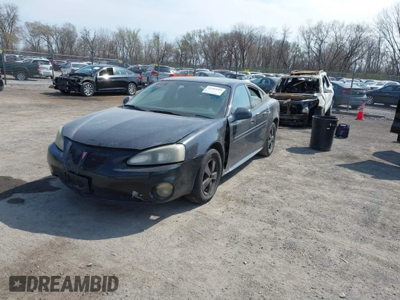 2008 Pontiac Grand Prix z VIN 2G2WP552281113384, wystawiony jako IAAI lot #41989008 z przebiegiem 242 354 mil mil oraz . Historia ofert i sprzedaży dostępna na DreamBid. Obrazek 17.