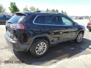 2019 Jeep Cherokee Latitude with VIN 1C4PJMCB0KD124765, listed as a Copart auction lot 59771225 with 147,815 mi miles and Salvage title. Bid and sale history available at DreamBid. Image 3.