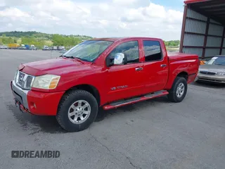 2005 Nissan Titan SE with VIN 1N6BA07B35N500027, listed as a IAAI auction lot 42150226 with 200,877 mi miles. Bid and sale history available at carsss.com. Image 2.