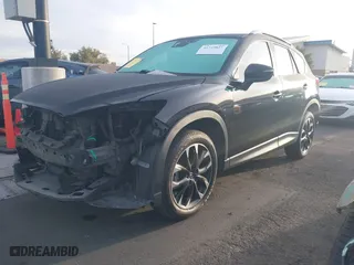 2016 Mazda CX-5 Grand Touring with VIN JM3KE2DY5G0725763, listed as a IAAI auction lot 41719827 with 173,547 mi miles. Bid and sale history available at carsss.com. Image 18.