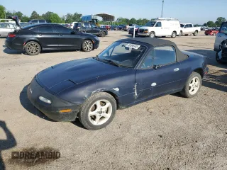 1996 Mazda MX-5 Miata z VIN JM1NA353XT0700457, wystawiony jako Copart lot #56596345 z przebiegiem 168 195 mil mil oraz Czysty tytuł • Clean title. Historia ofert i sprzedaży dostępna na DreamBid. Obrazek 1.